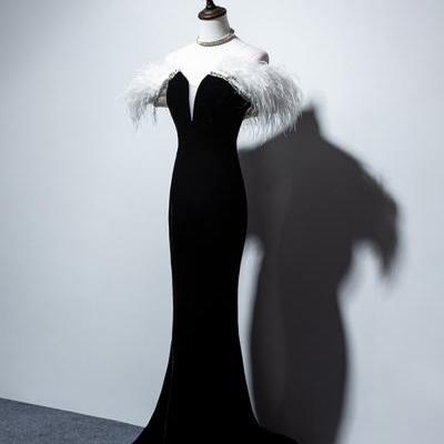 Feather velvet fishtail black evening dress